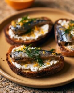 Crispy Sardine Toast with Lemon, Herbs, and Creamy Spread
